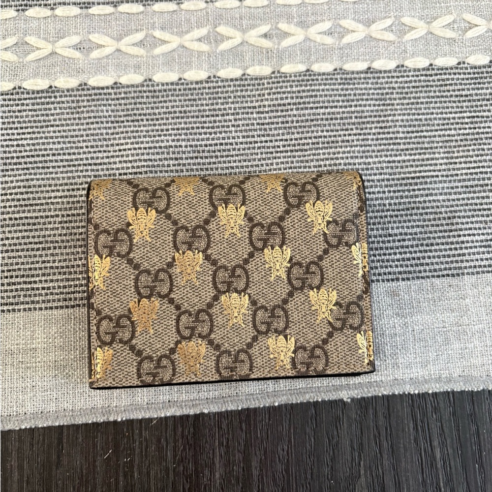 Gucci Women's Gold and Black Card Holder